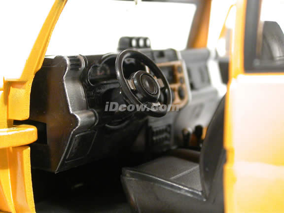 2007 Toyota FJ Cruiser diecast model car 1:24 scale die cast by Jada Toys - Yellow 91848