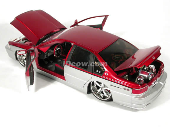 1996 Chevy Impala SS diecast model car 1:18 scale from Dub City Jada Toys - Metallic Red & Silver