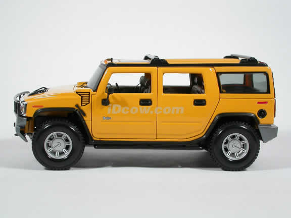 2003 Hummer H2 Diecast model car 1:18 scale die cast by Maisto - Yellow
