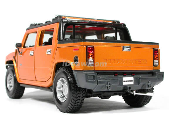 2004 Hummer H2 diecast model car 1:18 scale die cast by Maisto - Orange