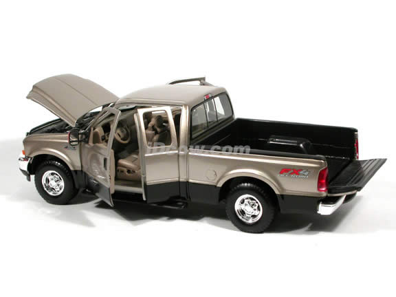 2004 Ford F-350 Lariat diecast model truck 1:18 scale die cast by Maisto - Gold and Black